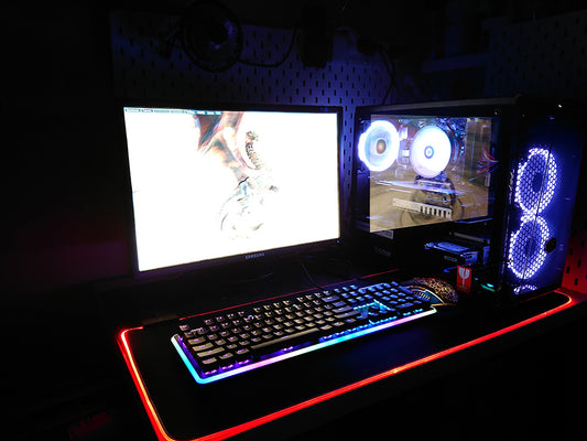 A PC gaming setup with RGB lighting