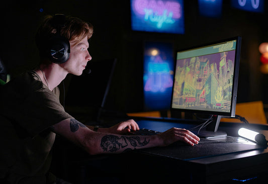 A man playing games on the PC