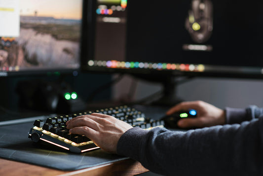 A picture of a man operating the gaming keyboard