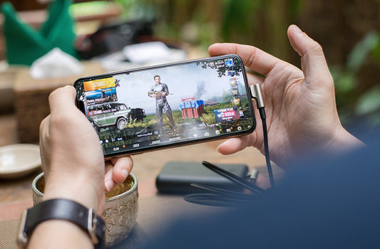 Person holding a phone playing PUBG Mobile