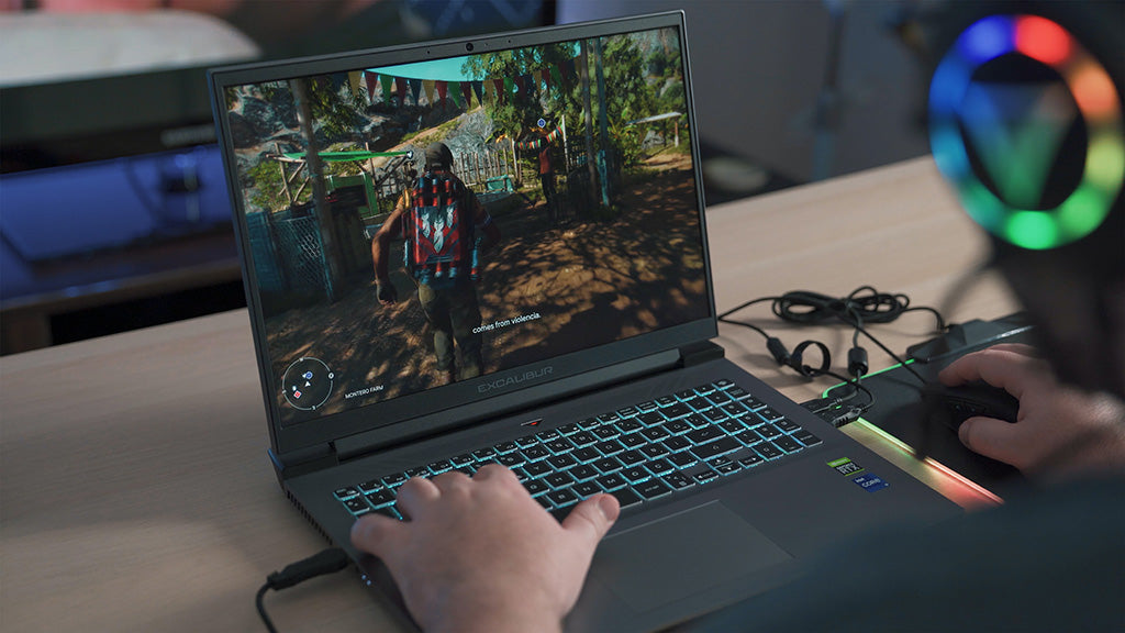 Person playing on a gaming laptop
