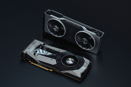 Two graphics cards, one is flat the other is standing up