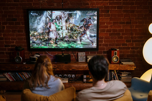 Two people playing video game together